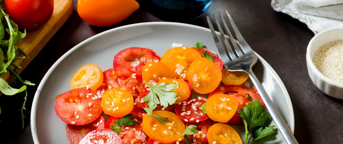 healthy salad with red and yellow cherry tomato